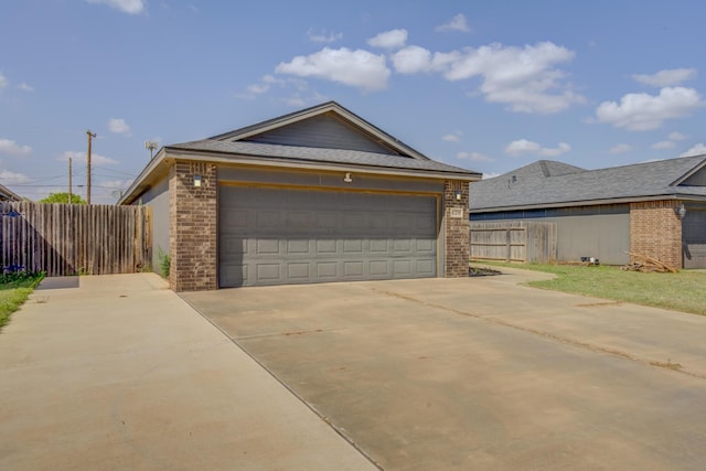 6208 21st St, Lubbock, TX 79407 - view of home's exterior with fence and brick siding