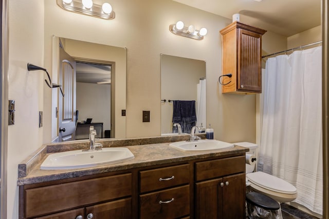 6208 21st St, Lubbock, TX 79407 - ensuite bathroom with toilet, ensuite bathroom, double vanity, and a sink