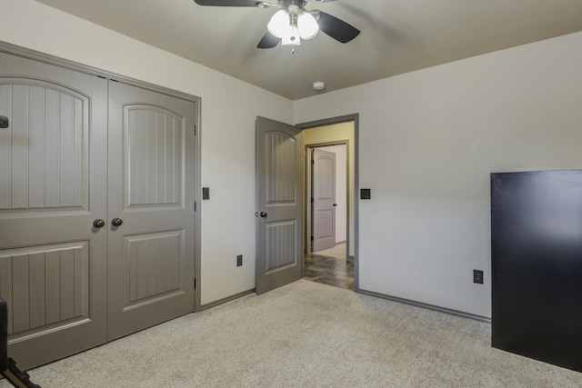 6208 21st St, Lubbock, TX 79407 - unfurnished bedroom featuring ceiling fan, carpet, a closet, and baseboards