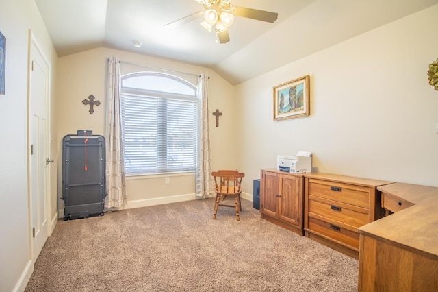 sitting room with lofted ceiling, light colored carpet, and ceiling fan