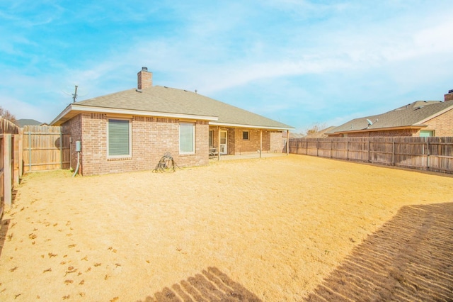 rear view of house featuring a patio area