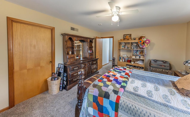 bedroom featuring carpet floors, a ceiling fan, and visible vents