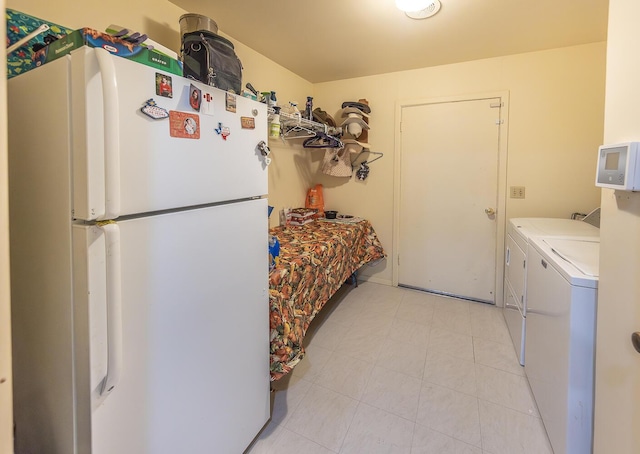 laundry area featuring independent washer and dryer and laundry area