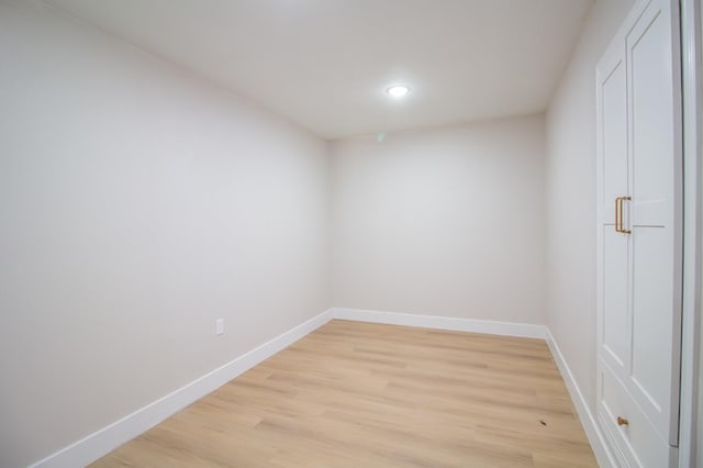 spare room featuring light hardwood / wood-style floors