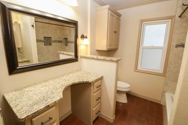 full bathroom featuring tiled shower / bath, vanity, toilet, and wood-type flooring