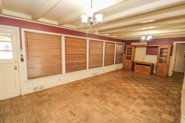 interior space with beam ceiling, parquet flooring, and an inviting chandelier