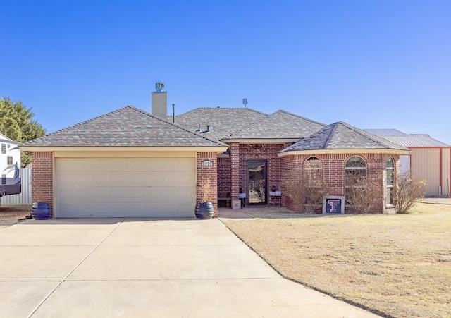 ranch-style house featuring a garage