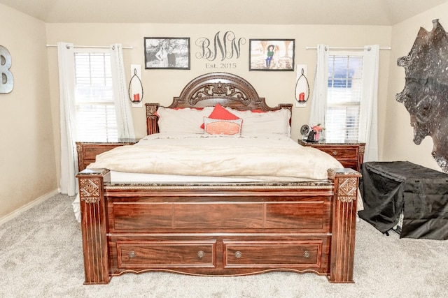 bedroom with light carpet