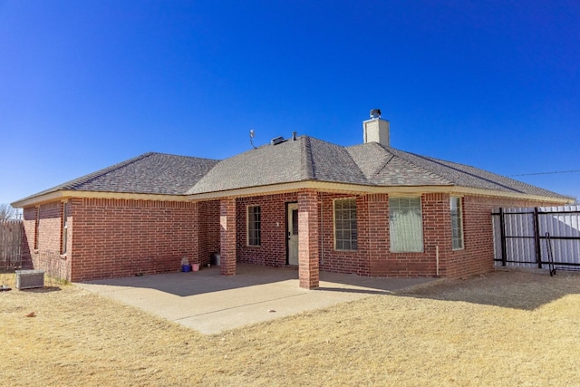 rear view of house with a patio