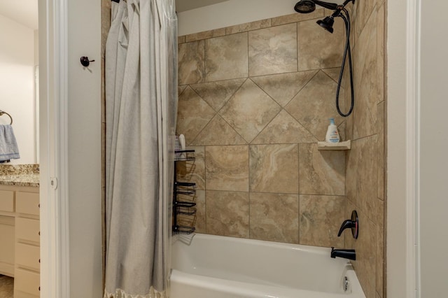 bathroom featuring vanity and shower / bath combo with shower curtain