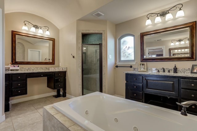 bathroom featuring vanity, tile patterned floors, and plus walk in shower