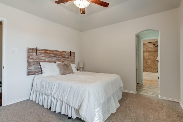 bedroom featuring ceiling fan and carpet