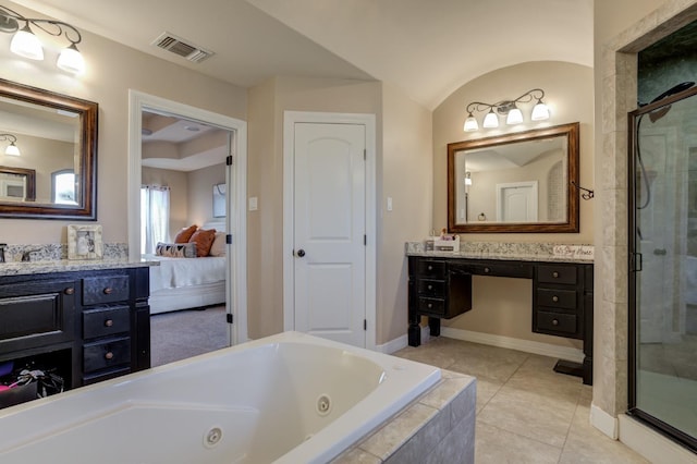 bathroom featuring vanity, tile patterned floors, and independent shower and bath