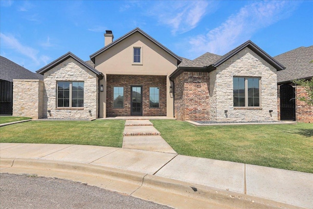 view of front of home with a front yard