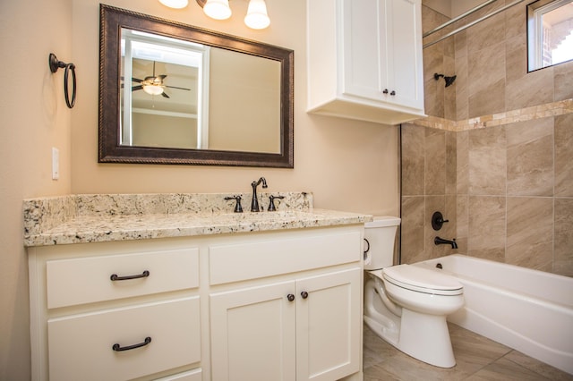 full bath with ceiling fan, shower / bath combination, vanity, and toilet