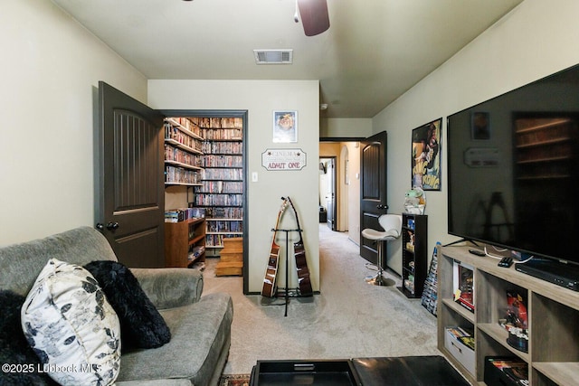 10018 Ave X, Lubbock, TX 79423 - living room featuring carpet flooring and a ceiling fan