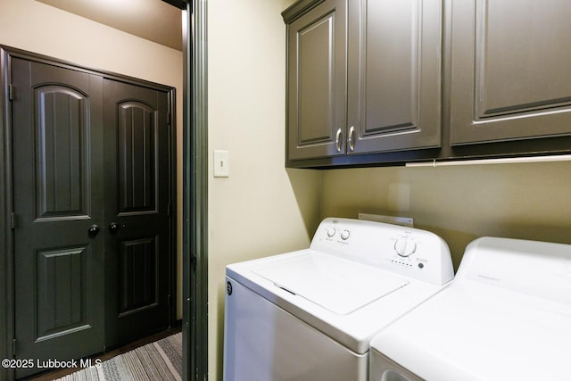 10018 Ave X, Lubbock, TX 79423 - washroom with washer and clothes dryer and cabinet space