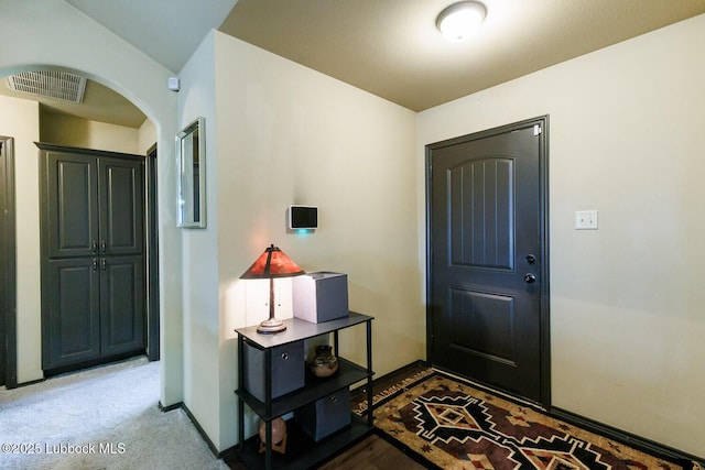 10018 Ave X, Lubbock, TX 79423 - entrance foyer with arched walkways and baseboards