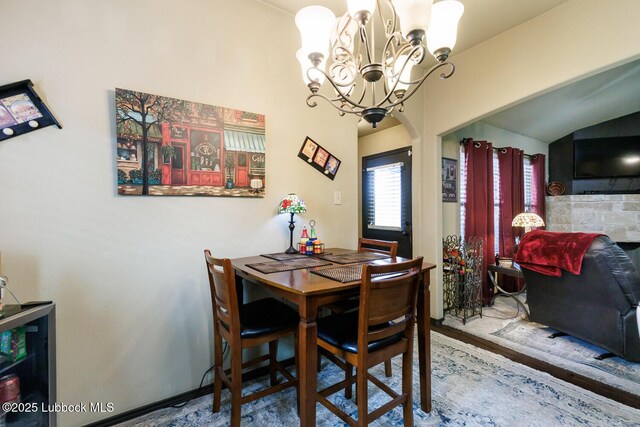 10018 Ave X, Lubbock, TX 79423 - dining space featuring a chandelier and wood finished floors