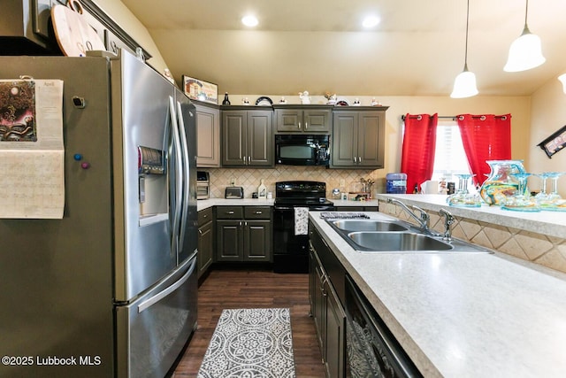 10018 Ave X, Lubbock, TX 79423 - kitchen featuring black appliances, a sink, dark wood finished floors, light countertops, and recessed lighting