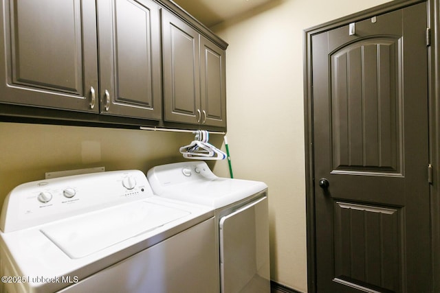 10018 Ave X, Lubbock, TX 79423 - laundry area featuring washer and clothes dryer and cabinet space