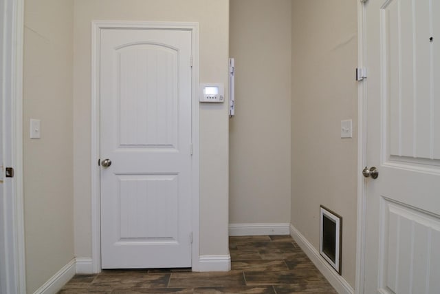 interior space with dark hardwood / wood-style flooring