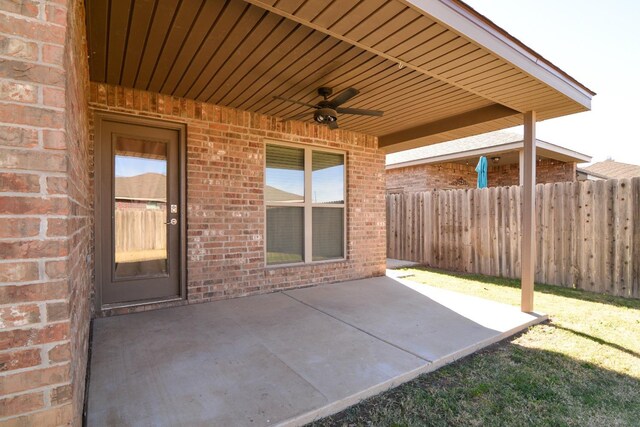 view of patio featuring ceiling fan