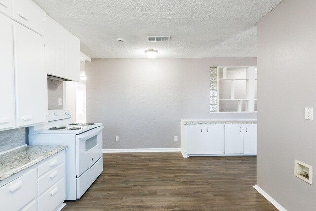 kitchen with white cabinetry, dark wood-type flooring, a textured ceiling, and electric stove