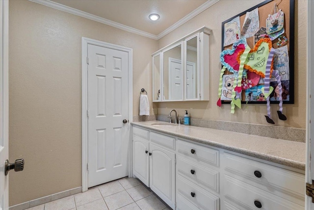 interior space with tile patterned floors, ornamental molding, and vanity