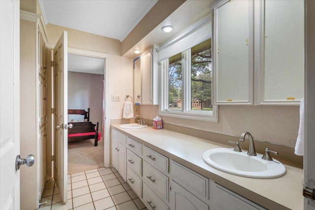 bathroom with vanity and tile patterned flooring