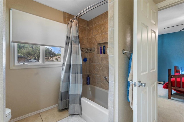 bathroom featuring tile patterned floors, toilet, and shower / bath combo