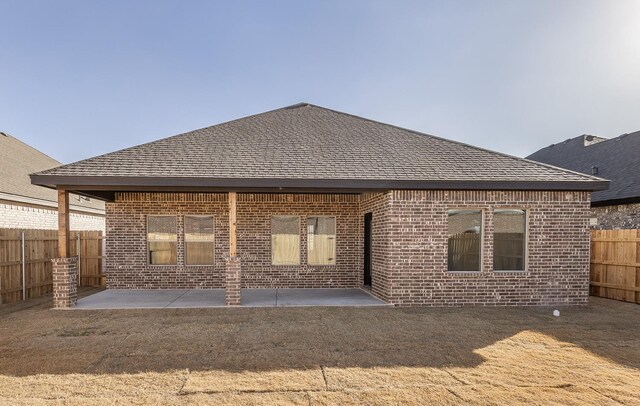 back of house featuring a patio