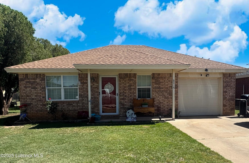 6315 24th St, Lubbock, TX 79407 - view of front of property featuring concrete driveway, an attached garage, a front lawn, brick siding, and a shingled roof