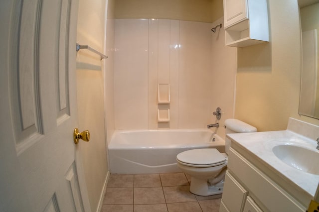 full bathroom featuring vanity, tile patterned floors, toilet, and washtub / shower combination