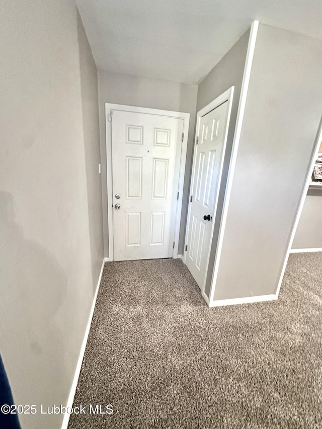 2802 54th St, Lubbock, TX 79413 - hallway featuring baseboards and carpet flooring