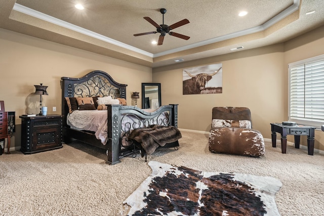 10801 Richmond Ave, Lubbock, TX 79424 - bedroom with a tray ceiling, crown molding, carpet flooring, a textured ceiling, and visible vents
