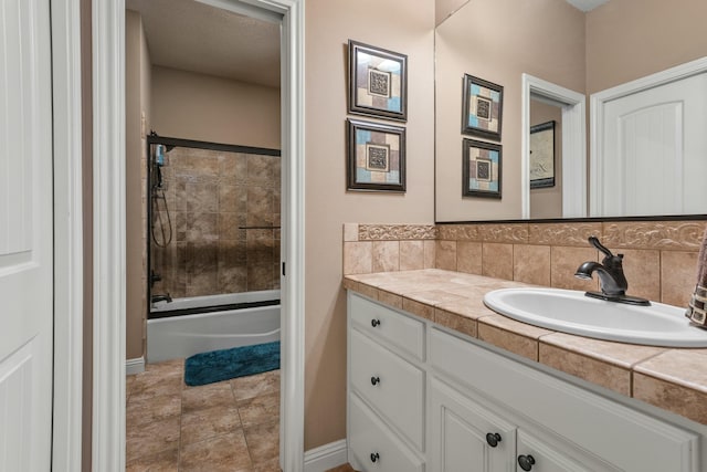10801 Richmond Ave, Lubbock, TX 79424 - bathroom featuring decorative backsplash, baseboards, vanity, and shower / bathtub combination