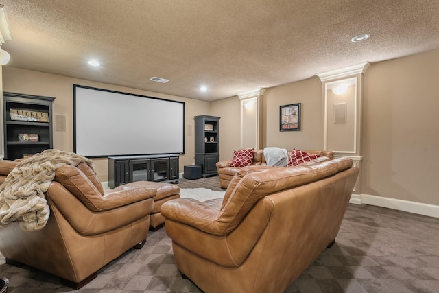 10801 Richmond Ave, Lubbock, TX 79424 - home theater with a textured ceiling, visible vents, recessed lighting, and decorative columns