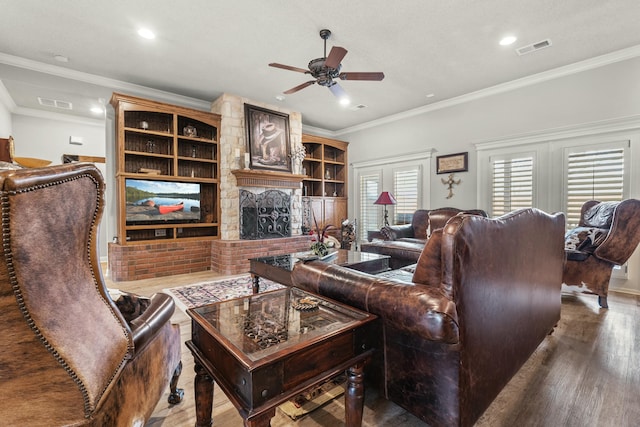 10801 Richmond Ave, Lubbock, TX 79424 - living area with crown molding, visible vents, a ceiling fan, and wood finished floors