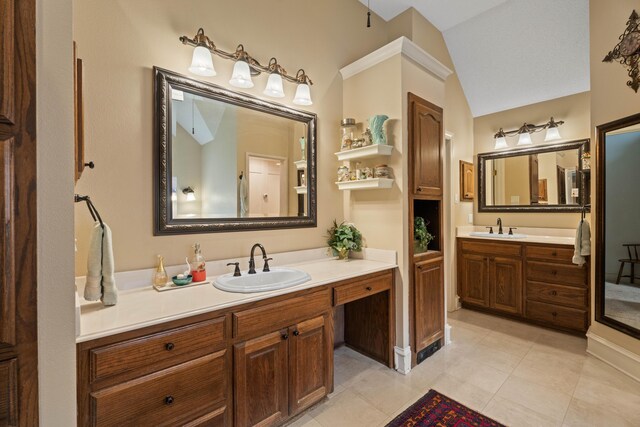 5401 County Rd 1420, Lubbock, TX 79407 - bathroom featuring vanity, vaulted ceiling, and tile patterned flooring