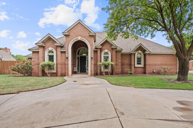 5401 County Rd 1420, Lubbock, TX 79407 - traditional-style house with brick siding and a shingled roof