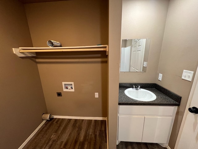 bathroom featuring hardwood / wood-style flooring and vanity