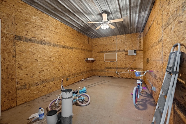 interior space with ceiling fan