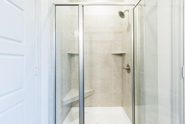 bathroom featuring walk in shower