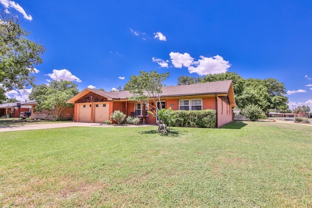 ranch-style house with a garage and a front yard