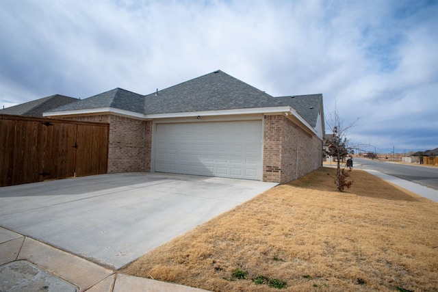 view of property exterior featuring a garage