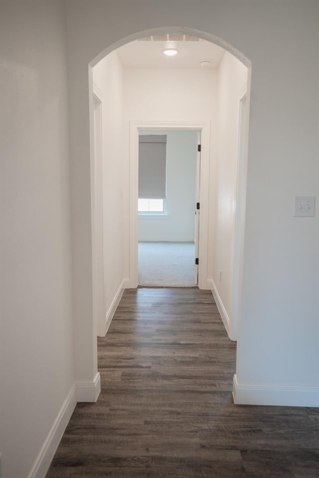 hallway featuring dark hardwood / wood-style floors