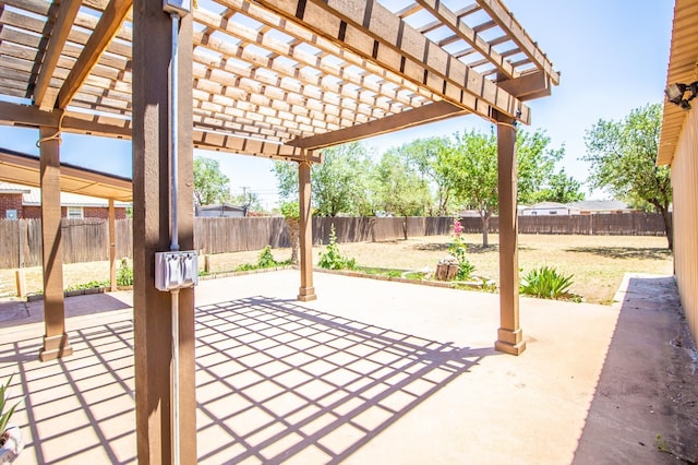 view of patio / terrace featuring a pergola and a fenced backyard