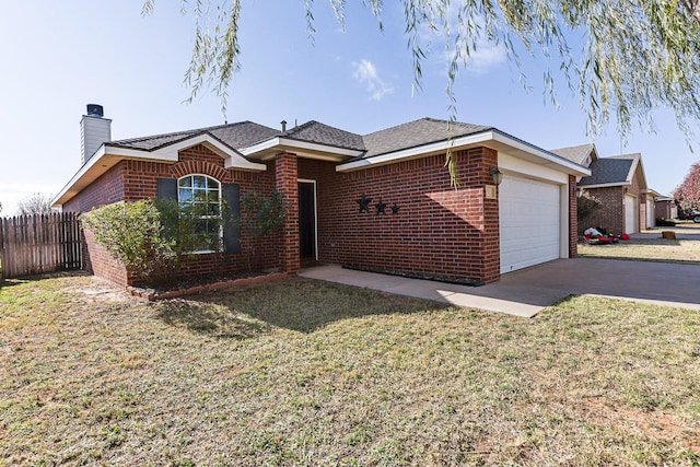 ranch-style house featuring a garage and a front lawn