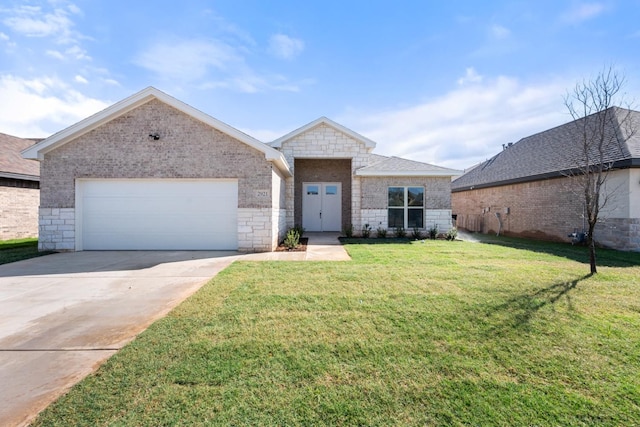 ranch-style house featuring a garage and a front yard